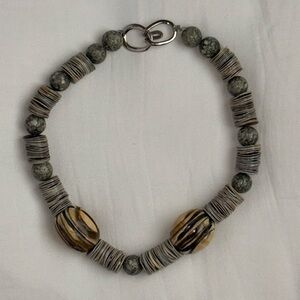 Necklace. Carved beads and shells.